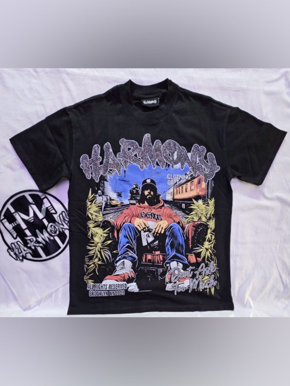 Harmony Graphic Tee in Black with Multicolor Print & stones.